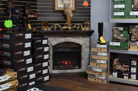 Adams_shoeboxes_stacked_around_fireplace
